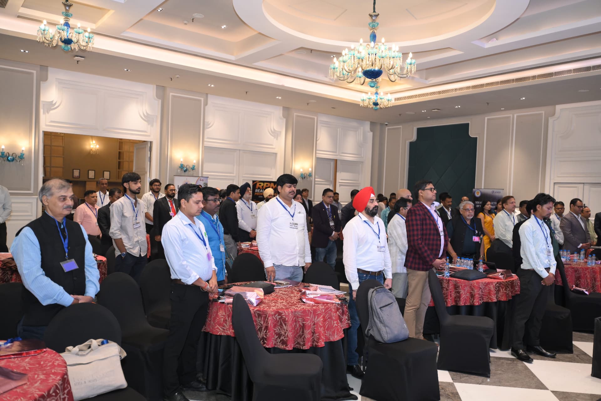Brokers standing together at the start of the session