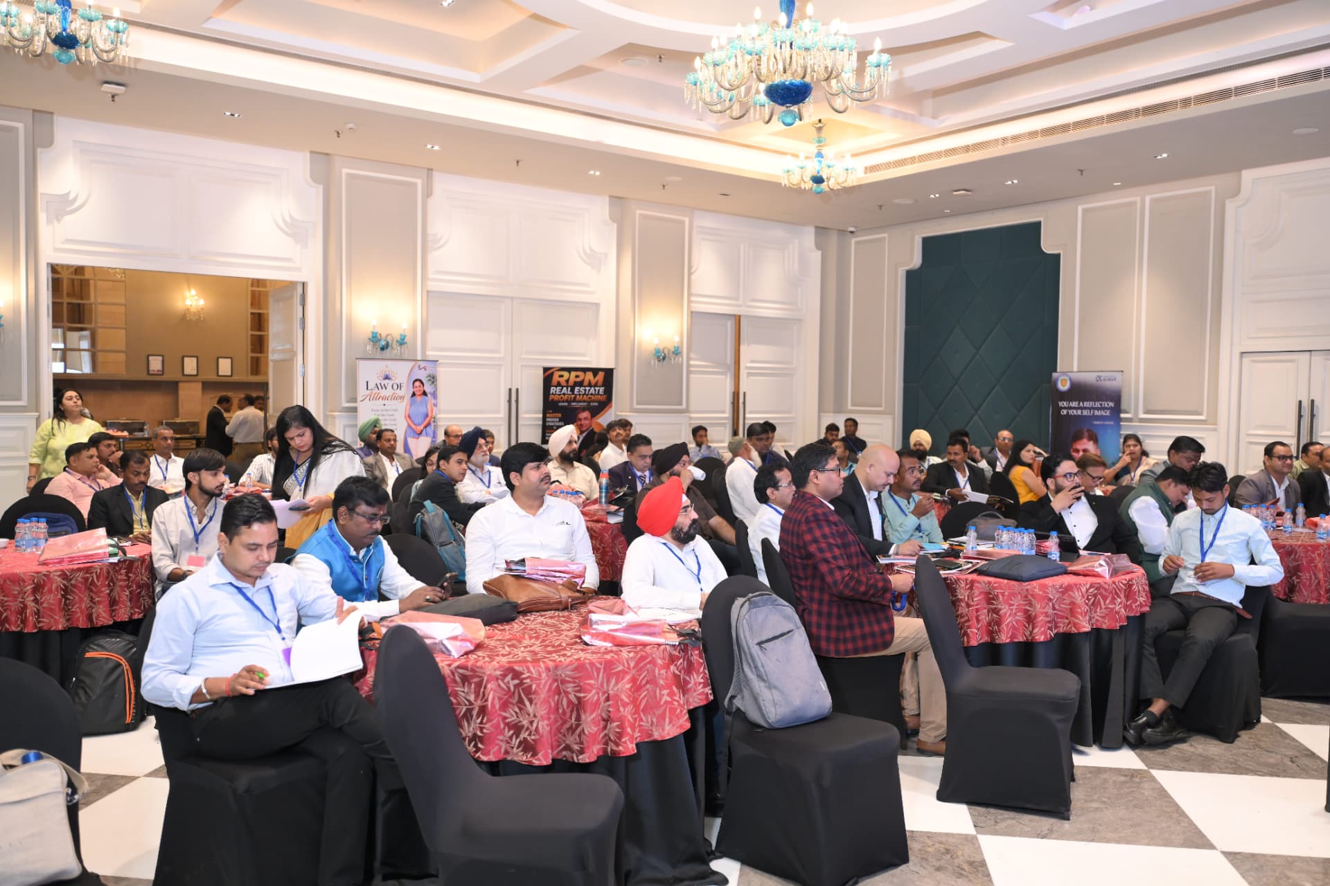 A full hall of real estate professionals at an RPM workshop