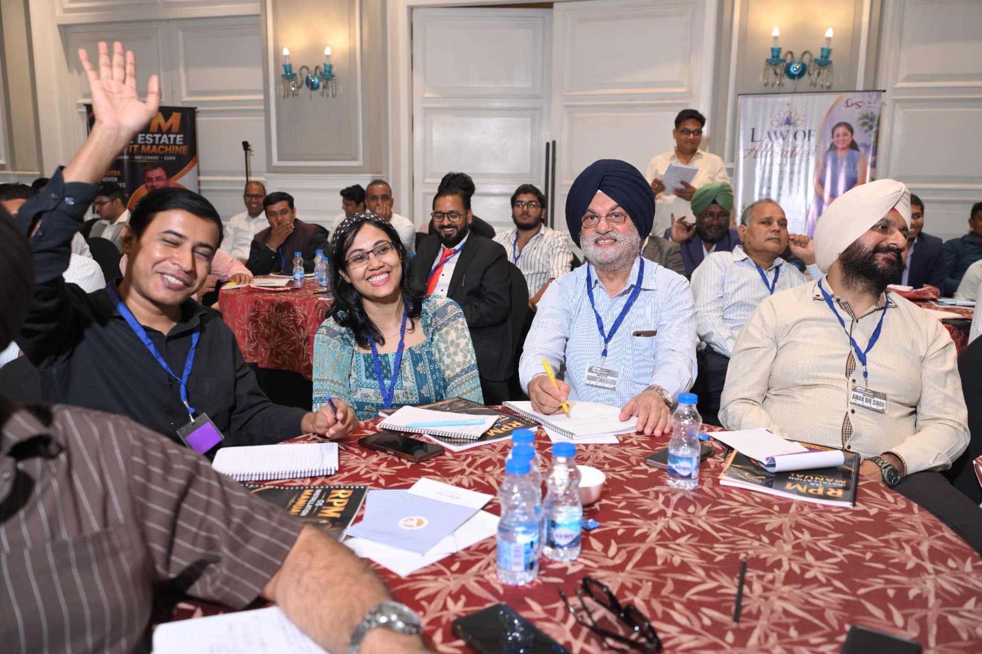 Participants taking notes in their RPM workbooks